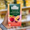چای احمد Ahmad Tea با طعم هلو و  پشن فروت Peach & Passion Fruit پک 20 تایی